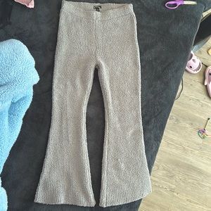 Gray fuzzy flared leggings.